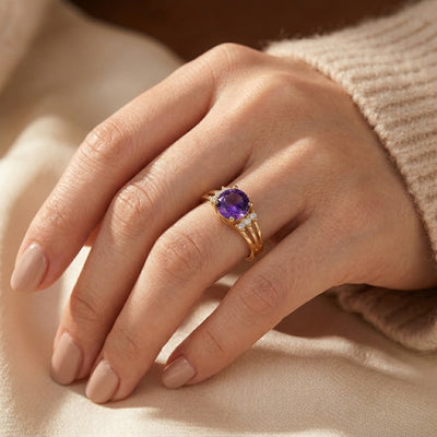 Bague en or à anneau dédoublé ornée d'une améthyste