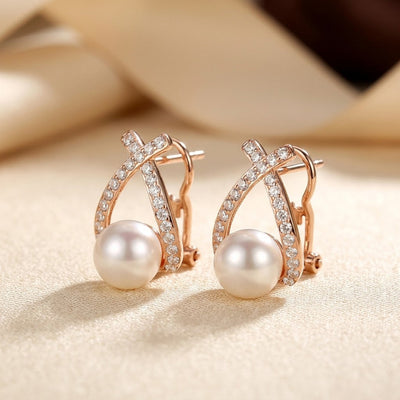 Boucles d'oreilles puces croisées en or et perles