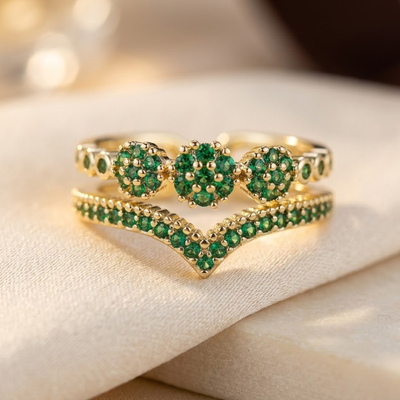 Bague marguerite en or et émeraude