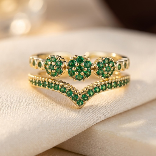 Bague marguerite en or et émeraude