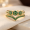 Bague marguerite en or et émeraude