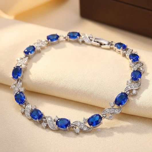 Bracelet à maillons floraux en argent et saphir