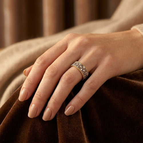 Bague ornée en argent et or