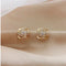 Gold Spiral Floral Stud Earrings with Crystal