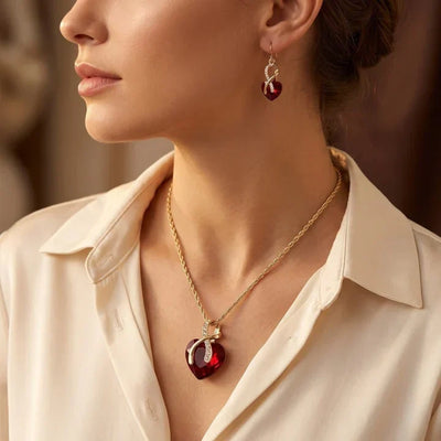 Parure de bijoux cœur torsadé en or et rubis