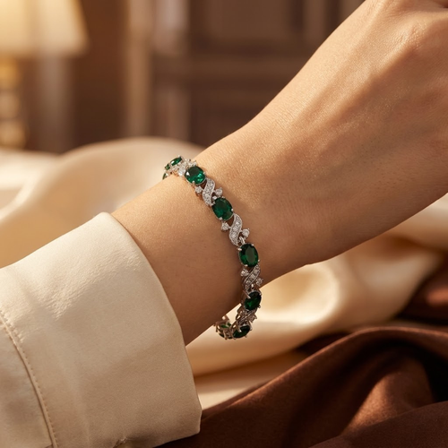 Bracelet à maillons vintage en argent et émeraude