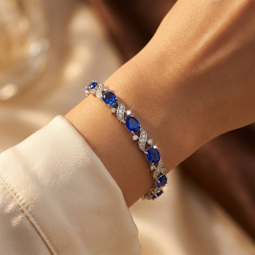 Bracelet à maillons floraux en argent et saphir