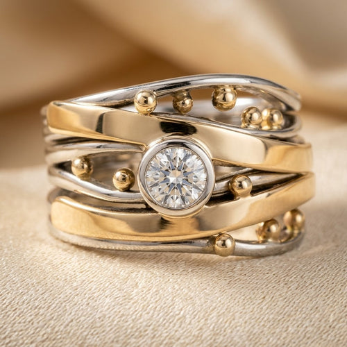 Bague sertie en argent et or