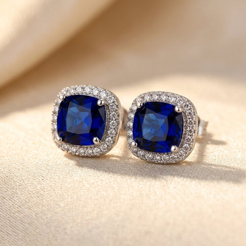 Boucles d'oreilles puces halo en argent et saphir