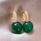Green Pearl Earrings in Gold