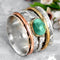 Bague avec contour accentué en argent, or et or rose