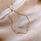 Bracelet cœur ajustable en or