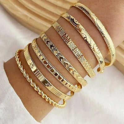 Ensemble de bracelets joncs ouverts dorés Resort