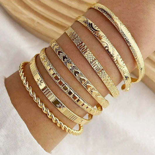 Ensemble de bracelets joncs ouverts dorés Resort