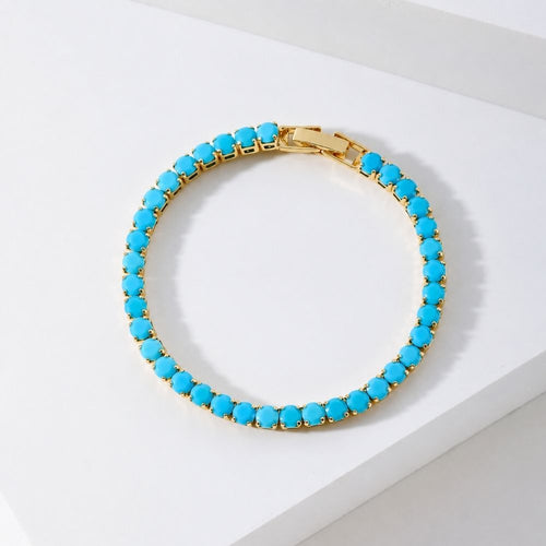 Bracelet tennis rond en or avec turquoise