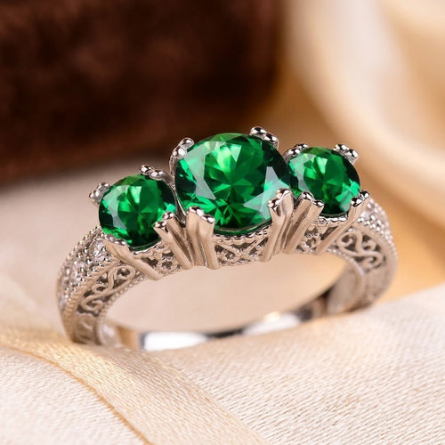 Bague trilogie en argent et émeraude