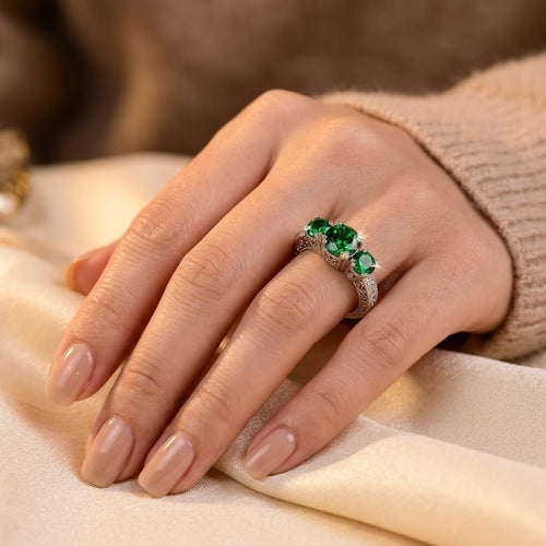 Bague trilogie en argent et émeraude