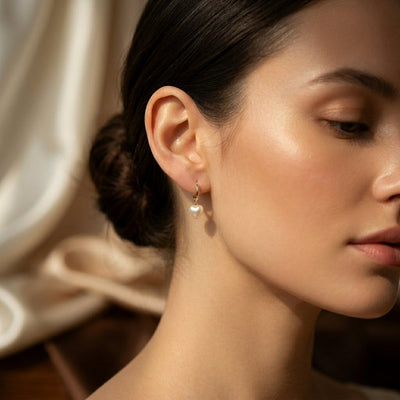Boucles d'oreilles pendantes perle et cœur en or