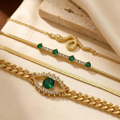 Ensemble de bracelets à breloques en or et émeraude