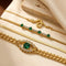 Ensemble de bracelets à breloques en or et émeraude