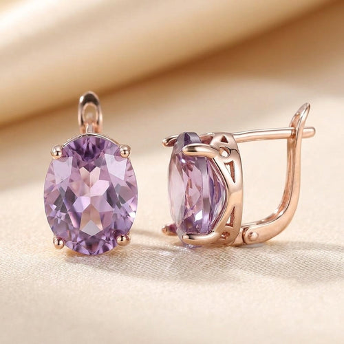 Boucles d'oreilles puces en or rose et améthyste