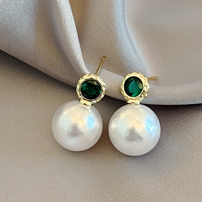 Boucles d'oreilles en perles avec cristal vert