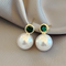 Boucles d'oreilles en perles avec cristal vert