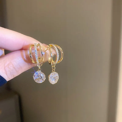 Élégantes boucles d'oreilles perles lumineuses