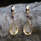 Boucles d'oreilles pendantes vintage en verre et or