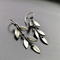 Boucles d'oreilles pendantes vintage en argent en forme de feuille