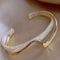 White opal elegant golden bracelet